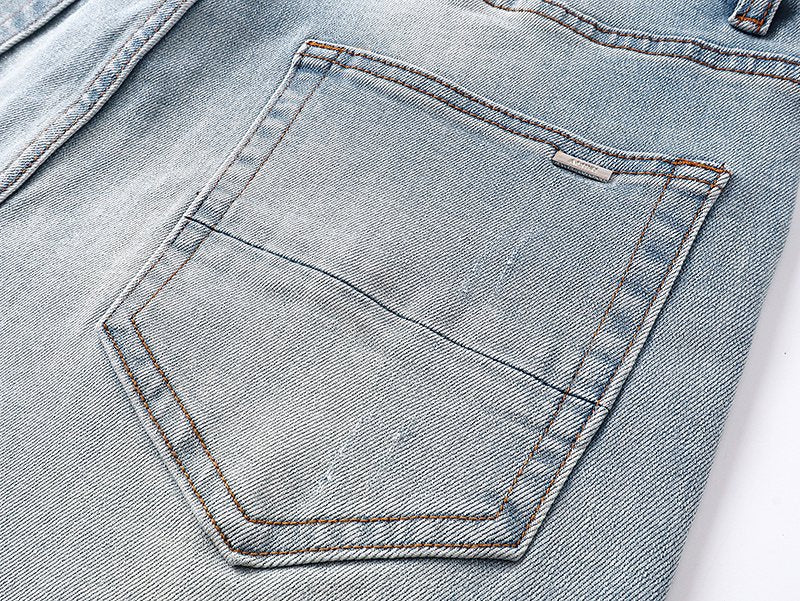 AMIRI Light Blue Patch Detail Slim Tapered Jeans — detail
