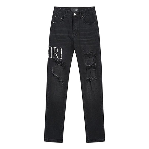 AMIRI Distressed Slim Tapered Jeans — hero