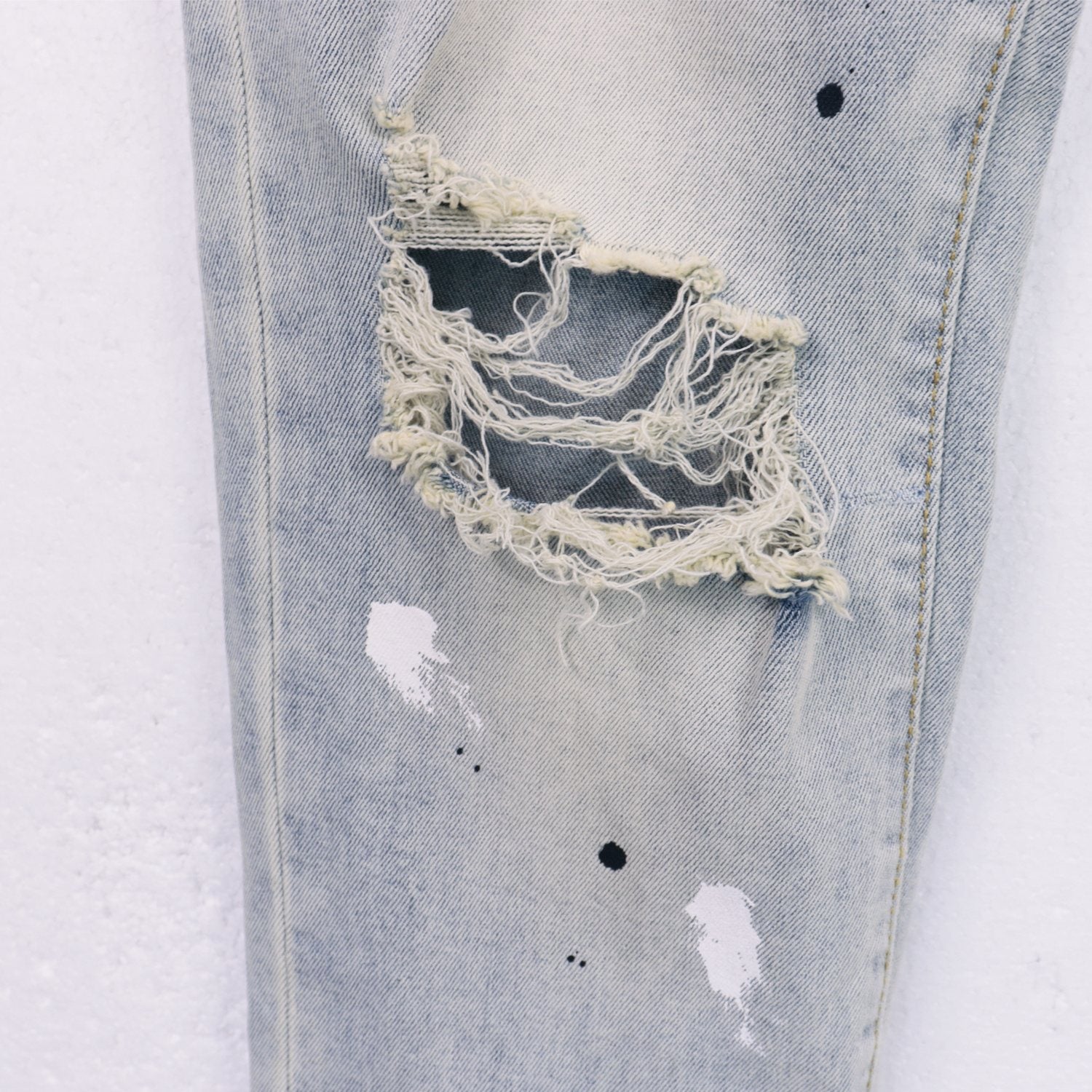 Purple Brand Light Blue Distressed Paint Splatter Jeans — detail