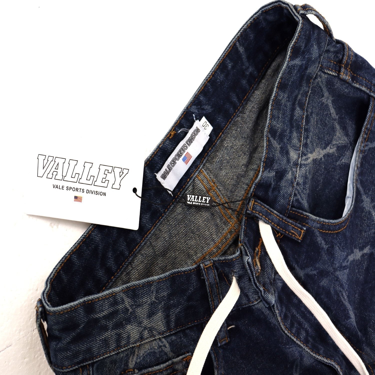 VALLEY Distressed Drawstring Shorts — hang_tag
