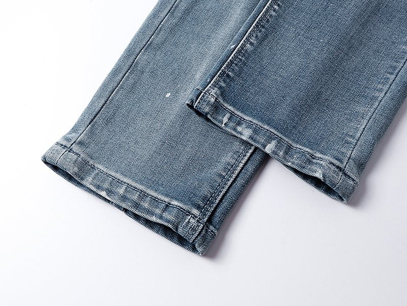 R+A Light Blue Paint-Splatter Patchwork Jeans — detail