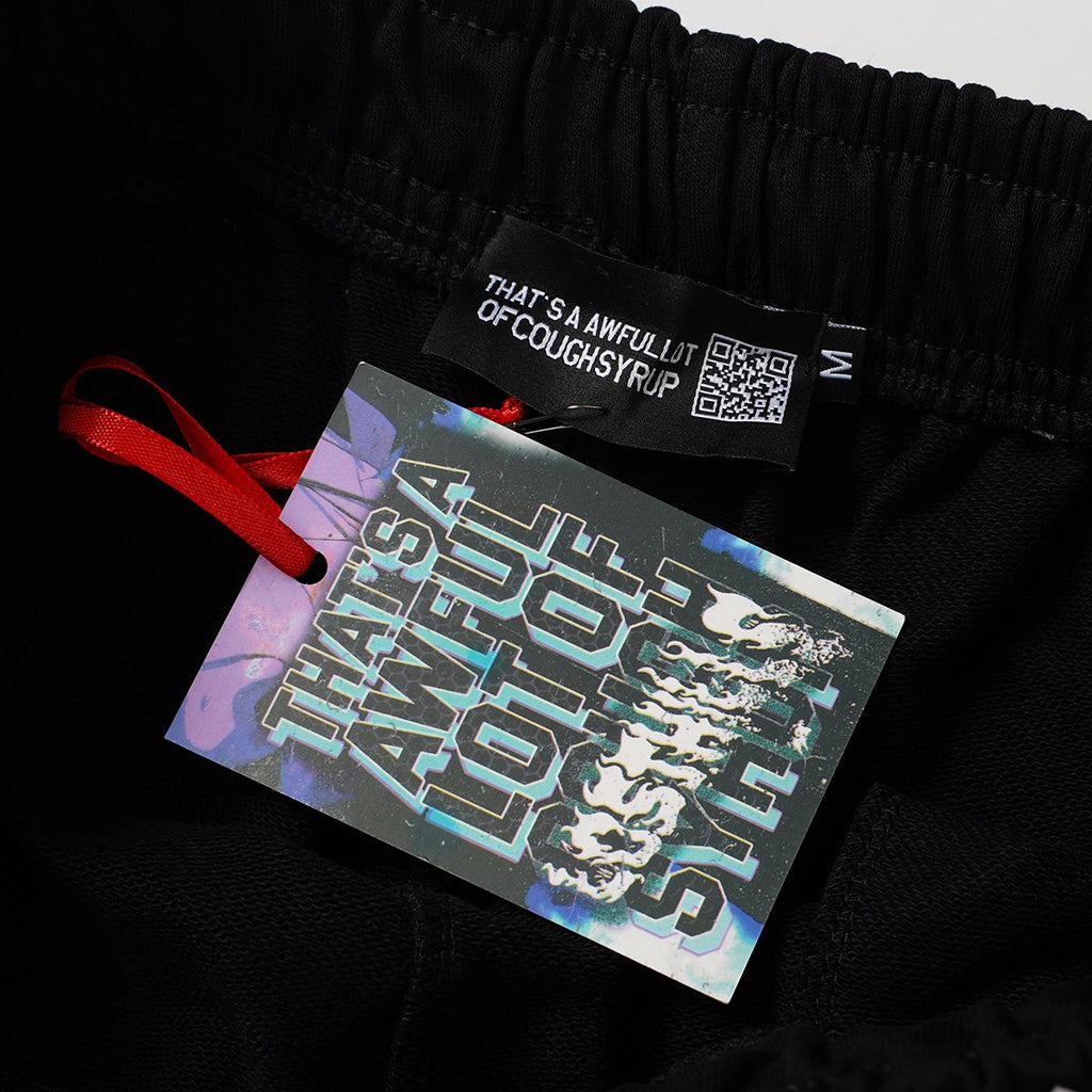 THAT'S A AWFUL LOT OF COUGH SYRUP Portrait Graphic Shorts — hang_tag