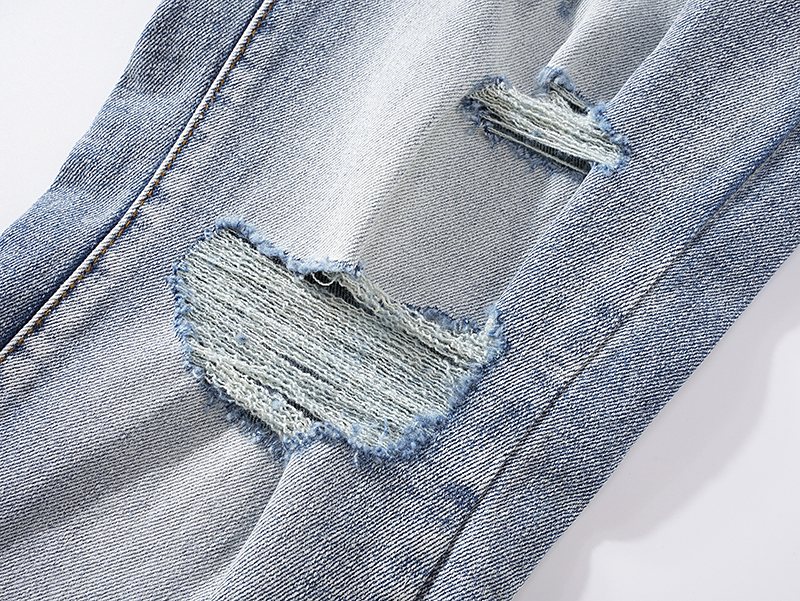 AMIRI Light Blue Distressed Ripped Knee Jeans — detail