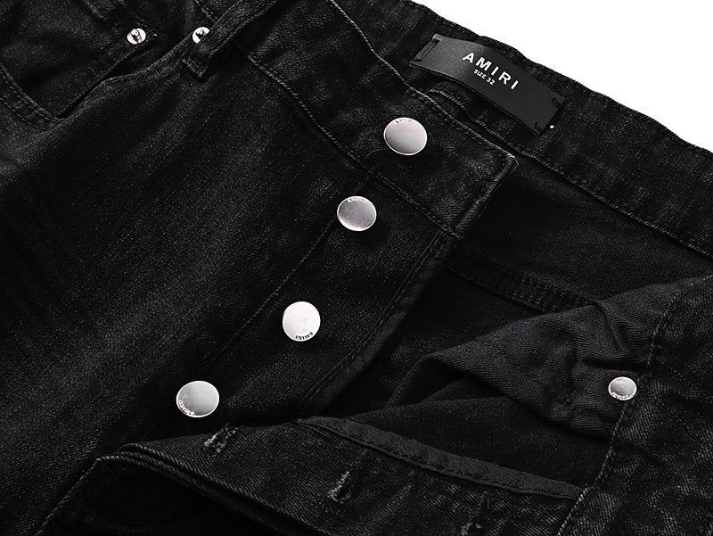AMIRI Black Distressed Ribbed Knee Jeans — detail